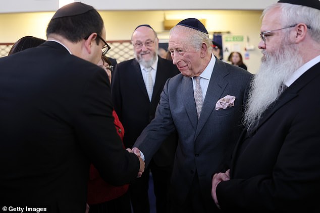 The King meets people on a trip to Heaton Park Hebrew Congregation Synagogue today