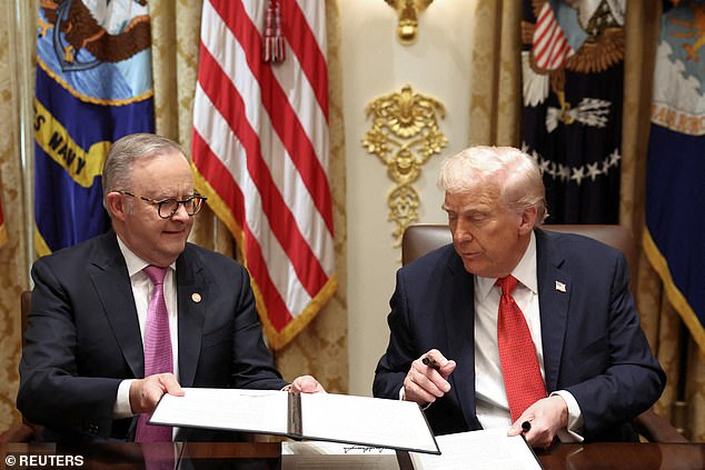 U.S. President Donald Trump and Australia's Prime Minister Anthony Albanese sign an agreement on rare earth and critical minerals