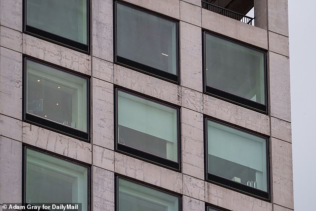 The grubby, cracked exterior of 432 Park Avenue is seen in a Daily Mail photograph shot today