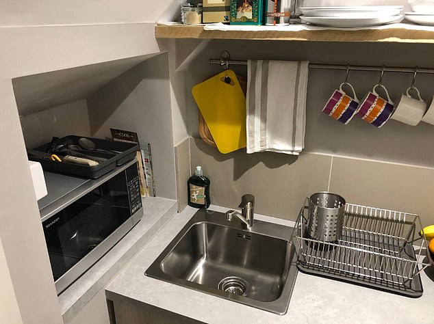 The guest kitchen in Ms Jordan's guest room, which comes with its own sink and fridge