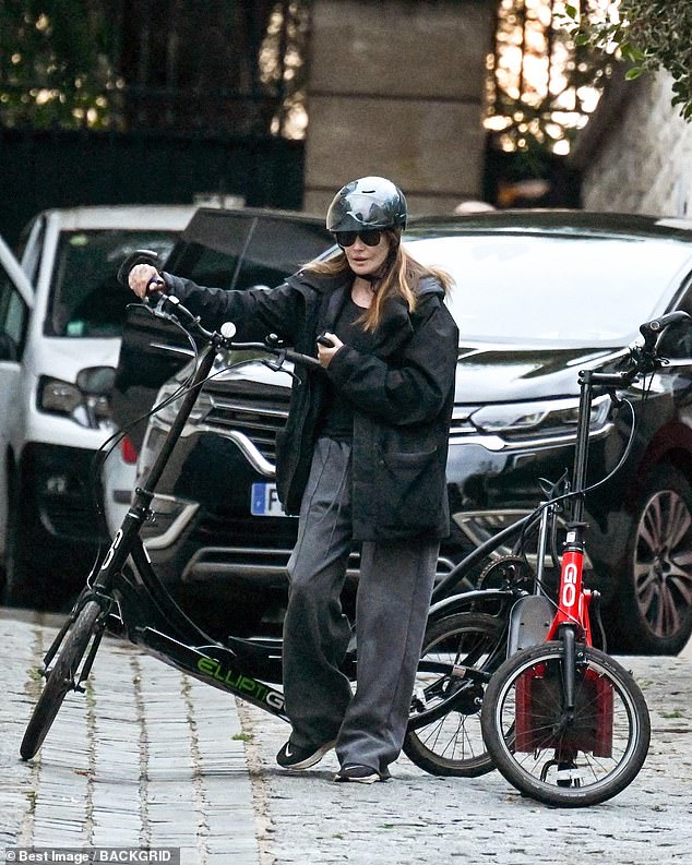 Carla Bruni took a scooter ride through Paris with a friend, while her husband Nicolas Sarkozy went for what may be his final jog on Monday