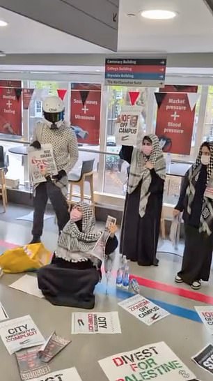 In other videos the students march through the corridors with megaphones and wearing surgical masks