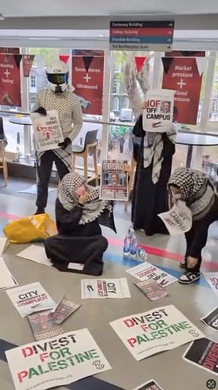 Footage from last week shows protesters take over the hallways chanting 'sack him now' as they don keffiyehs