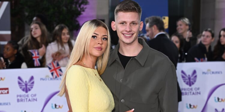 Freddy Brazier looks loved-up with pregnant girlfriend as they pose on red carpet after announcing baby news