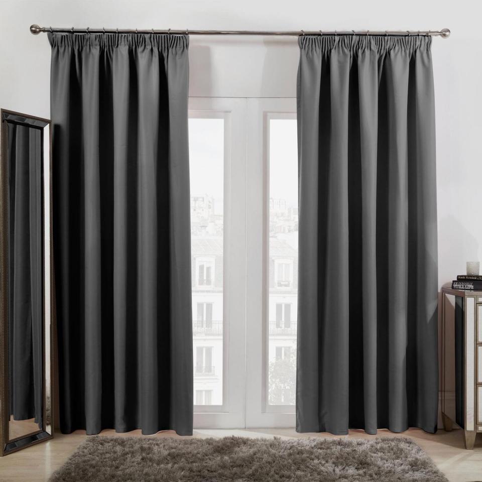 Pencil pleat blackout thermal curtains.
