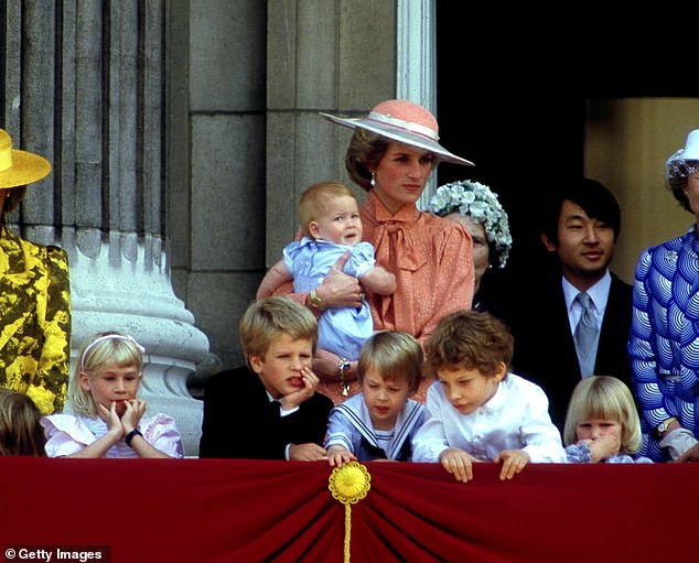 When Ms Kotb asked if he missed his beloved family members, the Duke spoke vaguely, instead choosing to shift his answers towards an enhanced focus on his late mother, Princess Diana, the People's Princess (pictured holding Harry in 1985)