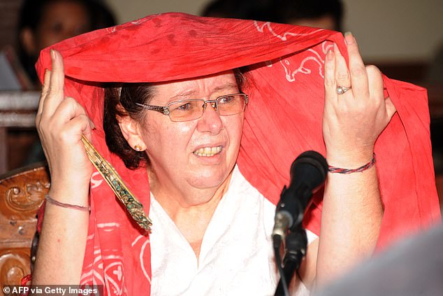 Customs officers found cocaine worth an estimated $2.14 million hidden in a false bottom in Sandiford's suitcase when she arrived in Bali on a flight from Thailand in 2012