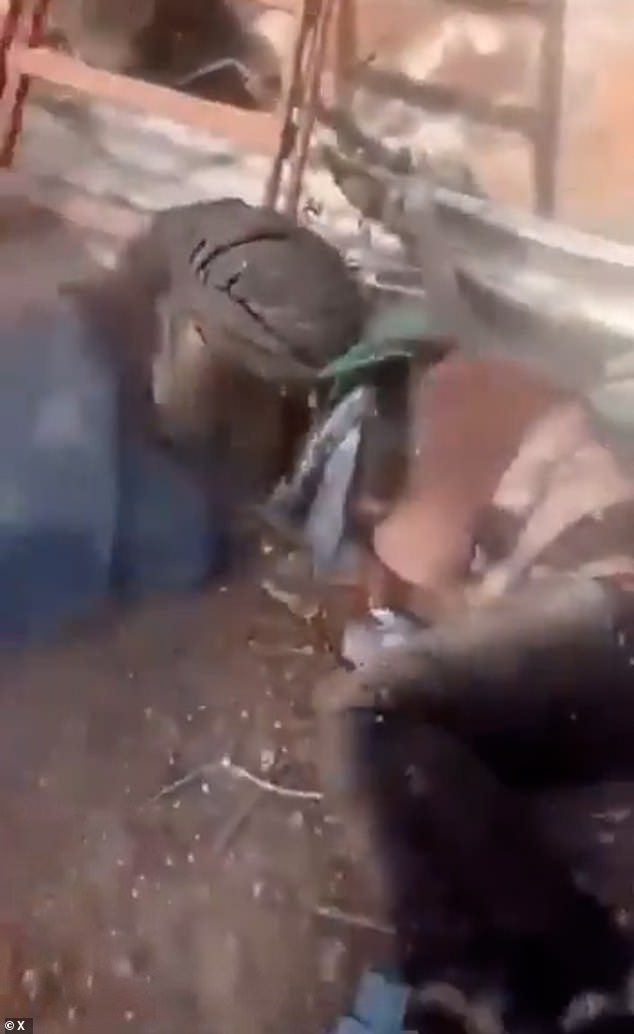 Two men were dragged and thrown into a dirty corner as they were simultaneously beaten by the masked group