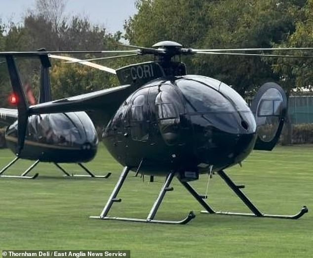 Image shows a helicopter landing outside the Thornham Deli