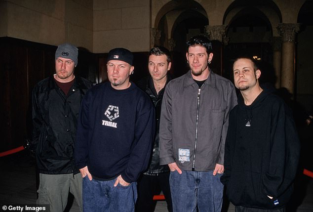 Rivers first met the lead vocalist of the band Durst in the 90s while working at Chick-fil-A, going on to form Limp Bizkit in 1994 alongside drummer Otto, with guitarist Borland and turntablist DJ Lethal also joining two years later (seen in 2000)