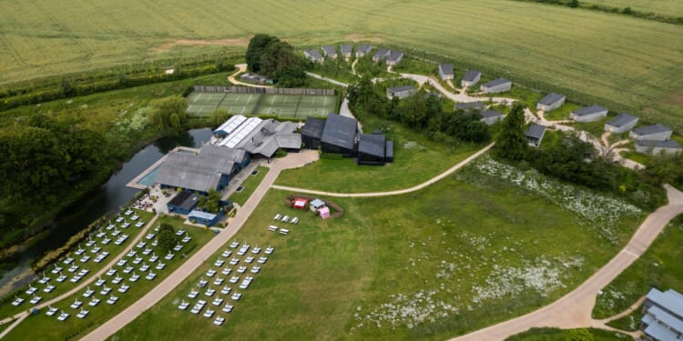 Billionaire locked in bitter neighbour row over plans for 'monstrous carbuncle' mansion with 'gun room and new lake'