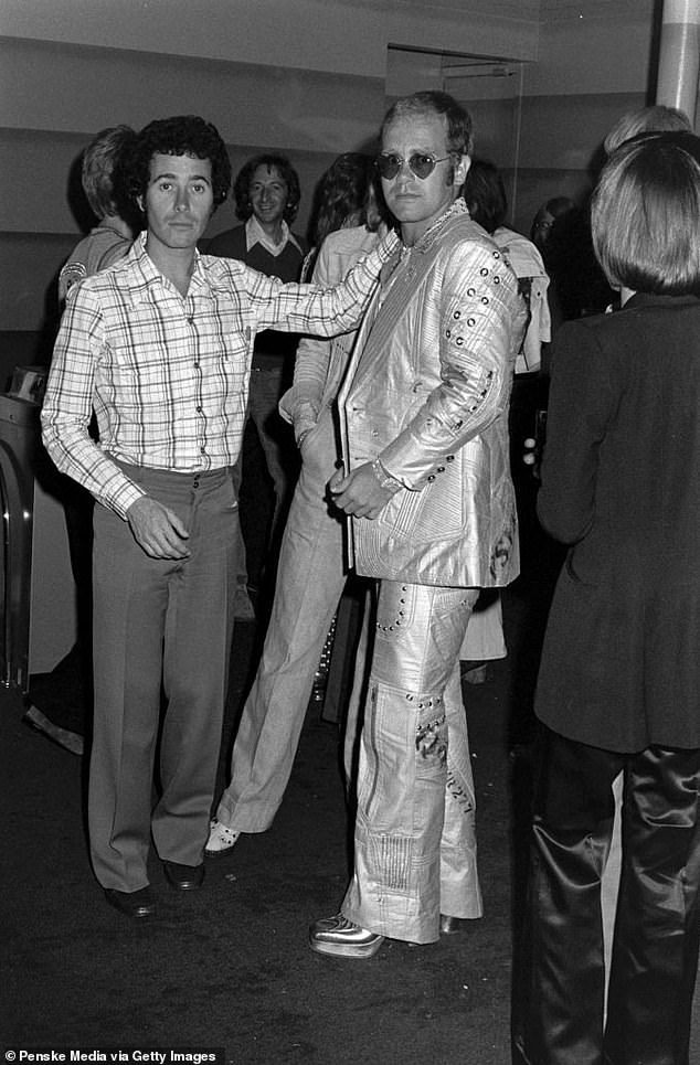 Michaels claims he was 'awestruck by Geffen', a 'philanthropist' who 'talked the talk' when the younger man revealed issues 'during his underprivileged upbringing,' during the ill-fated couple's first meeting nine years ago. Pictured: David Geffen (L) and Elton John attend the opening of the Roxy Theatre in Hollywood, California