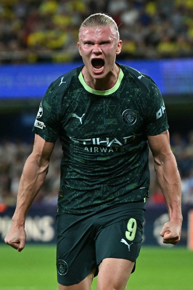 Manchester City's Erling Braut Haaland celebrates scoring his team's first goal.