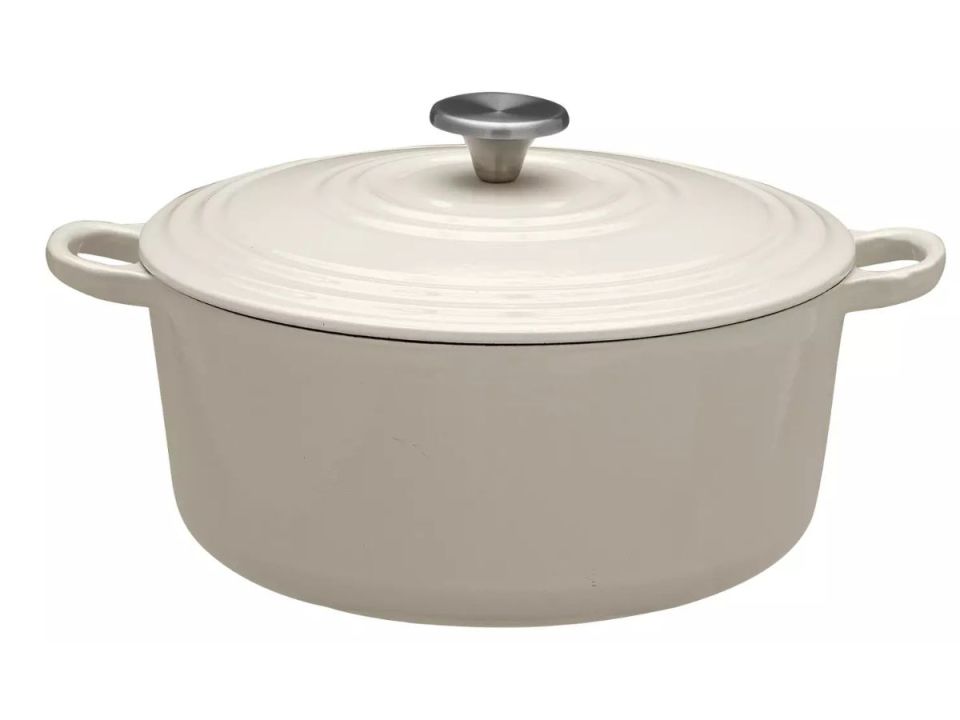 Cream-colored Dutch oven with lid.