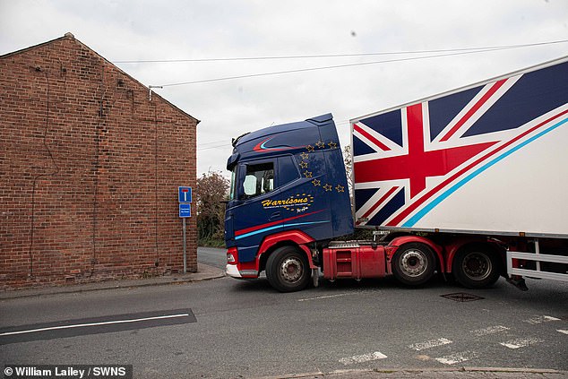 The official-looking blue warnings were spotted in Tarleton, Lancashire, and read 'Camiones No Pasar', which is Spanish for 'Trucks Do Not Pass'