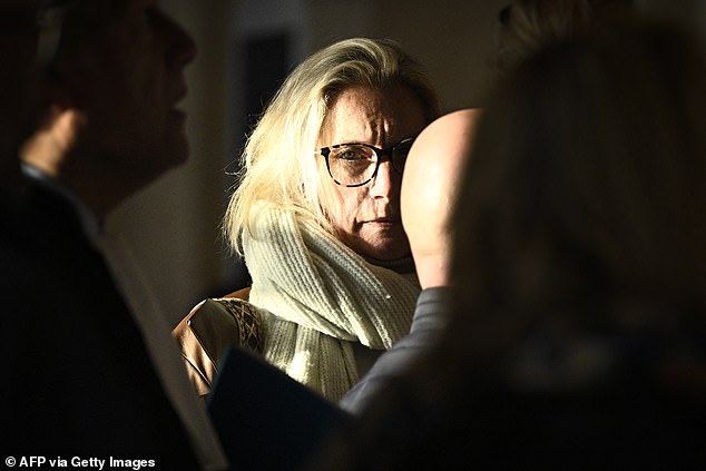 Lola's mother arrives at the Paris Assize Court on October 17, 2025, for the trial of Dahbia Benkired, accused of raping, torturing, and killing the young girl