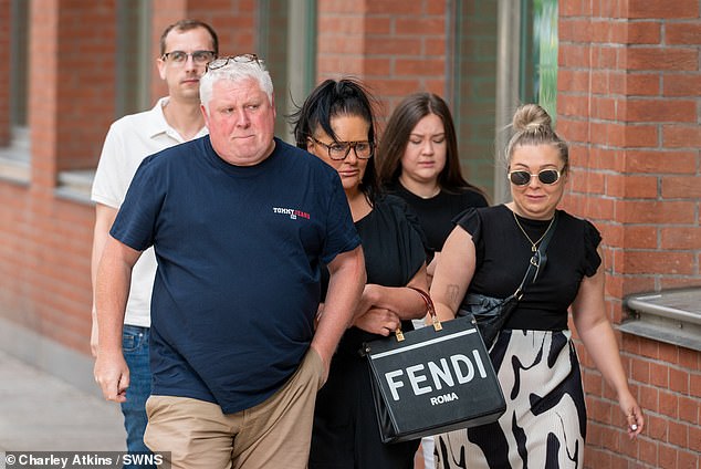 Harvey's family, pictured arriving at court yesterday as the jury continued deliberations, have been present for most days of the trial