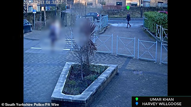 Khan entering school, before he later stabbed fellow pupil Harvey to death during a lunch break