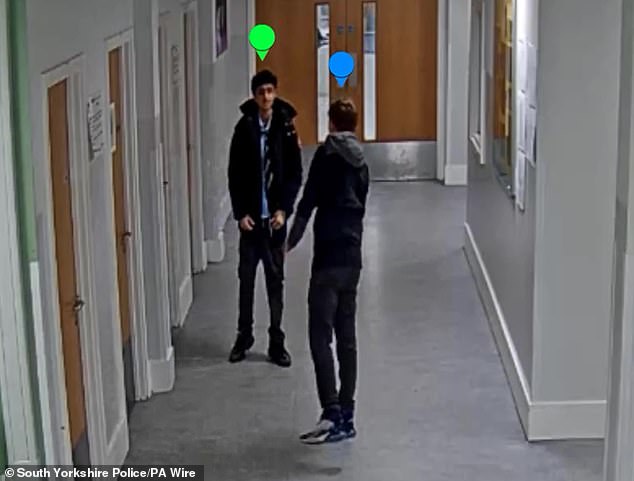 CCTV filmed in the corridor of the school in Sheffield before Khan killed fellow pupil Harvey