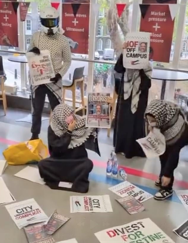 Footage from last week shows protesters take over the university's hallways chanting 'sack him now'
