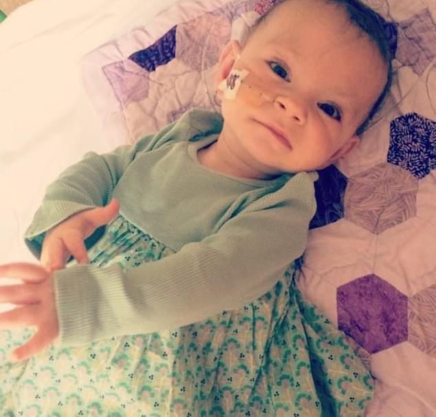 Orla (pictured as a baby) is now in agony when she tries to walk and is hoping for a powered wheelchair