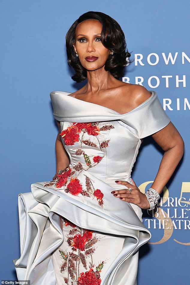 She accessorized with silver bracelets