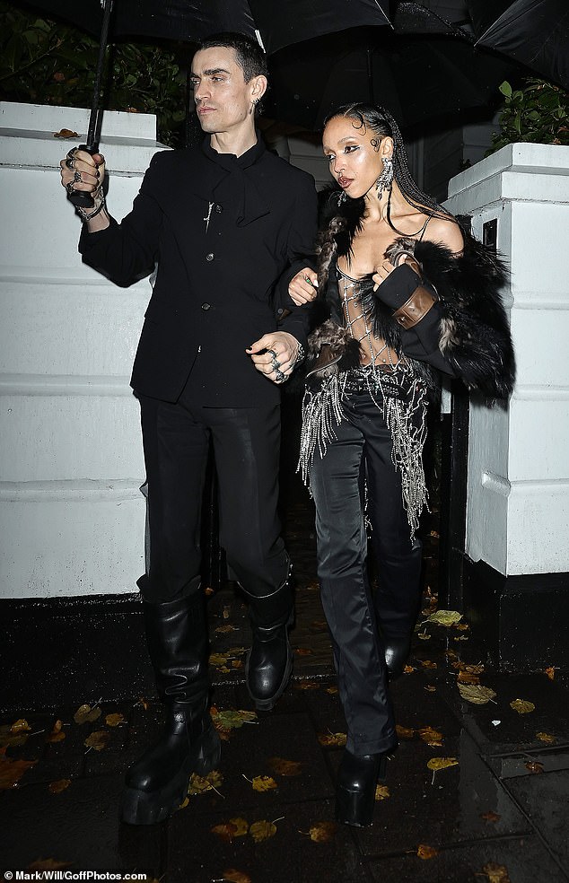 She added a chic fur jacket to her look