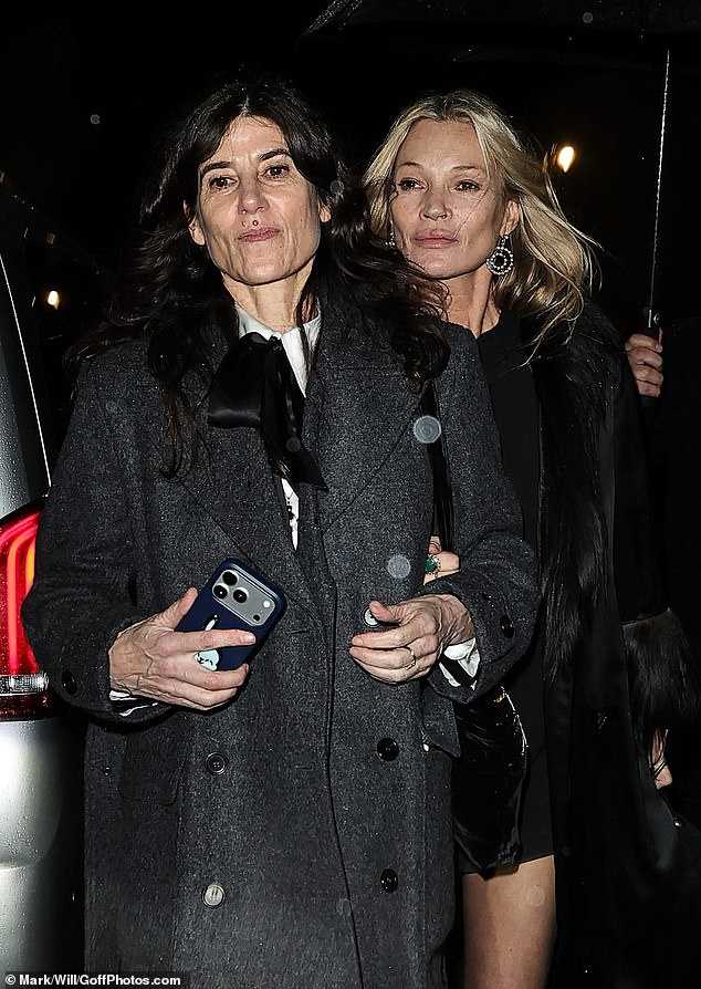 Kate accessorised her look with statement silver earrings