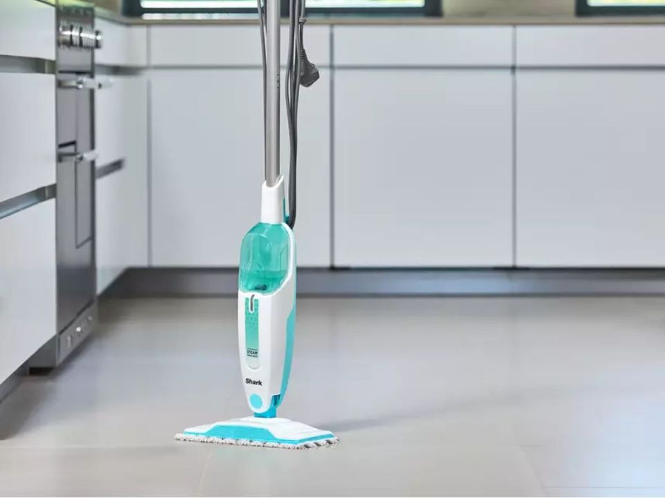 Shark steam mop on a kitchen floor.