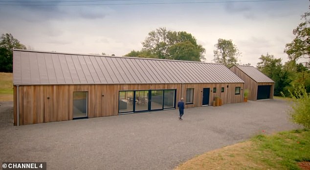 Kevin McCloud is pictures viewing the finished house that Malene moved into a year after Pep died