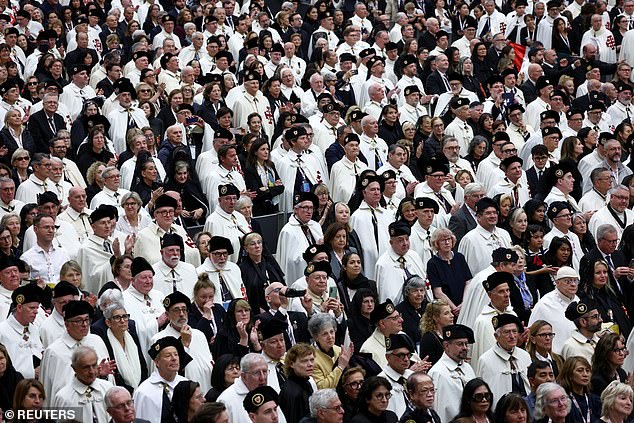 Members of the Equestrian Order of the Holy Sepulchre of Jerusalem attend the meeting today