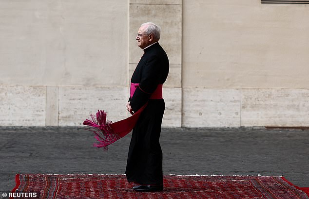 Monsignor Leonardo Sapienza waits for the arrival of King Charles and Queen Camilla today