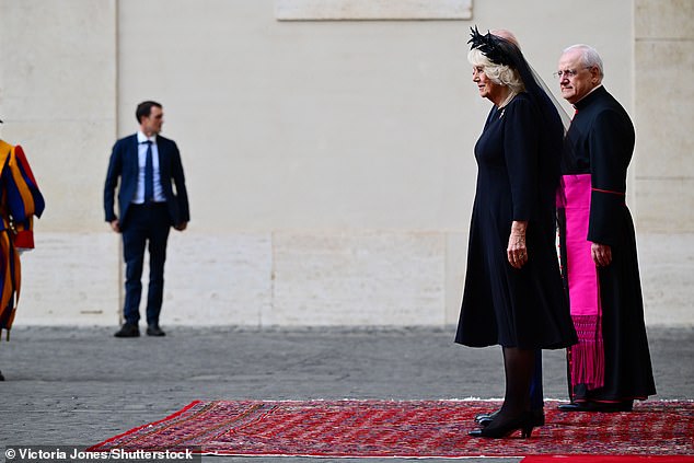 King Charles III and Queen Camilla are welcomed by officials at San Damaso Courtyard today