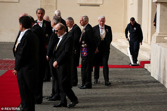 Invited guests arrive at San Damaso Courtyard in Vatican City for the state visit this morning