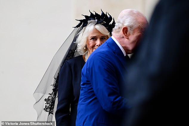 King Charles III and Queen Camilla are welcomed by officials at San Damaso Courtyard today