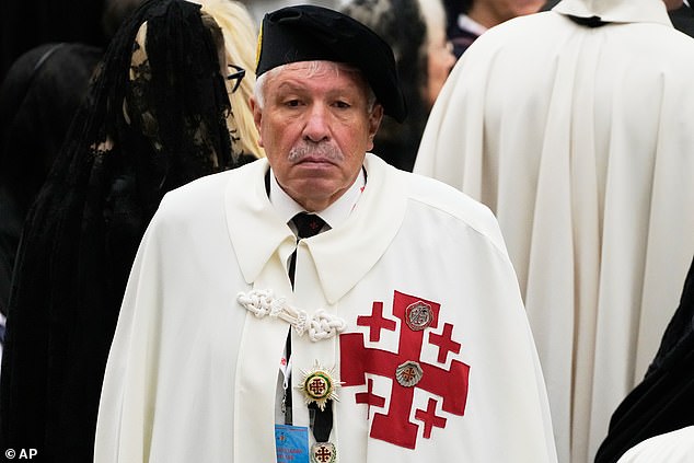 Members of the Equestrian Order of the Holy Sepulchre of Jerusalem wait to meet Pope Leo