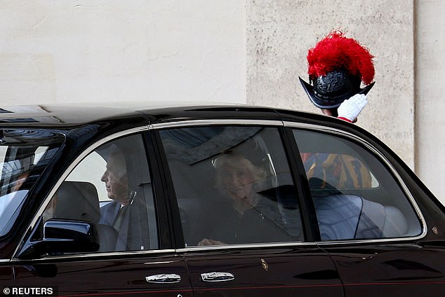King Charles III and Queen Camilla are welcomed by officials at San Damaso Courtyard today