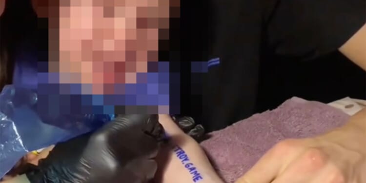 Horror moment parents 'TATTOO' screaming one-year-old baby in sick bid to win a free flat from twisted 'trash streamer'