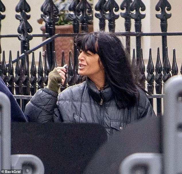 The star opted for a casual look as she walked the streets of London in a black puffer jacket and denim jeans