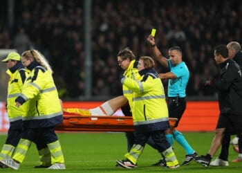 Watch bizarre moment Go Ahead Eagles star given yellow card... as he gets STRETCHERED OFF pitch vs Aston Villa