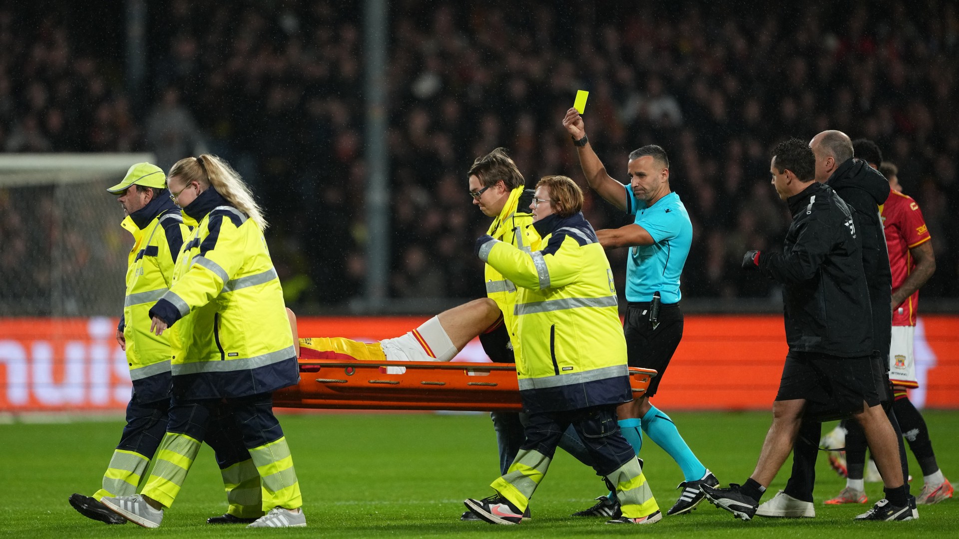 Watch bizarre moment Go Ahead Eagles star given yellow card... as he gets STRETCHERED OFF pitch vs Aston Villa