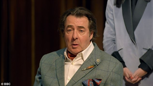 After voicing his suspicions about Traitor Jonathan to Nick Mohammad, strident faithful Joe declared: 'I'm going to go for Jonathan. He's the wolf of the traitors , time's up for Mr Ross'