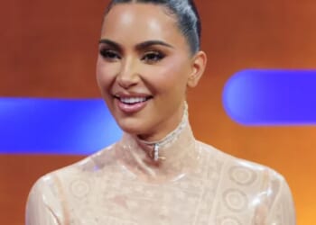 Kim Kardashian wears VERY daring nude latex mini-dress as she talks new TV role on Graham Norton Show