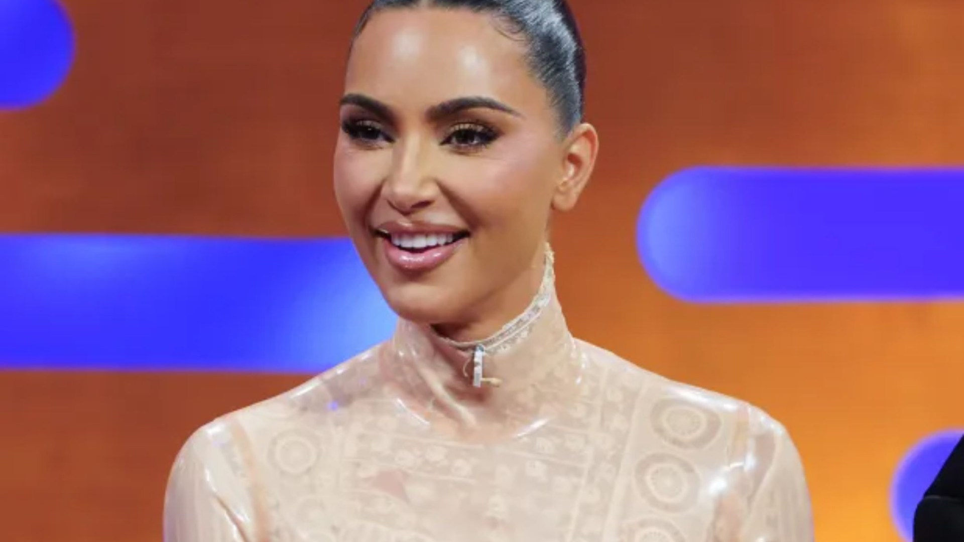 Kim Kardashian wears VERY daring nude latex mini-dress as she talks new TV role on Graham Norton Show