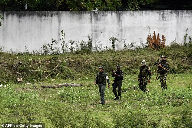 Venezuelan military patrol around the Simon Bolivar International Bridge at the Colombia-Venezuela border as seen from Villa del Rosario, Colombia on October 16, 2025