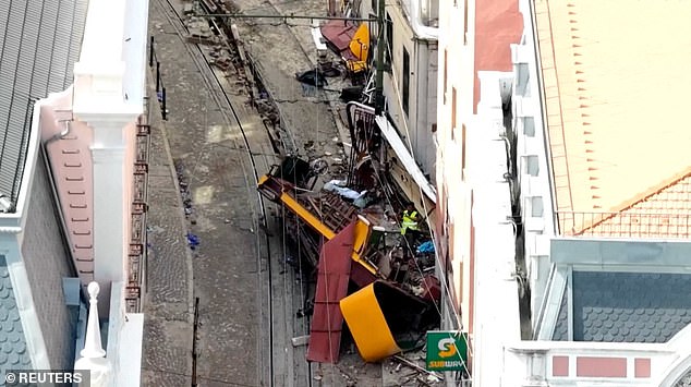 The site of the accident after the Gloria Funicular railway car derailed and crashed in Lisbon, Portugal
