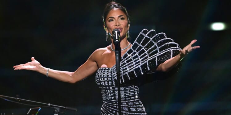 'Devastated' Nicole Scherzinger breaks silence on 'diva' claims as she reveals all about Thom Evans wedding plans