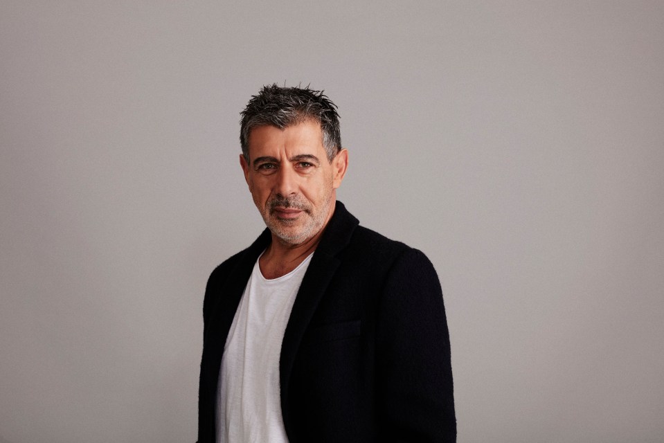 Radio 2 presenter Gary Davies in a black coat and white t-shirt.