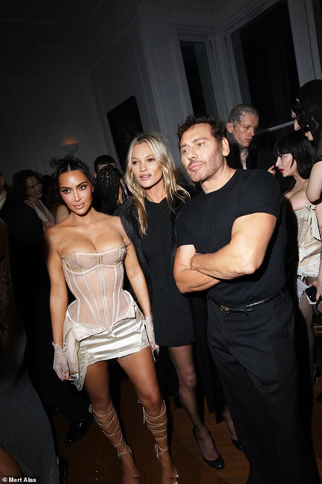 Another picture saw her looking sensational alongside Kate and Mert