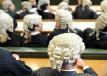 British criminal courts to make major change that will end 350-year tradition after barristers raised complaints